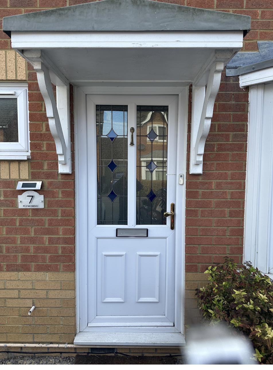 Original front door before replacement — RyBuild before and after